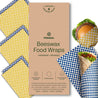 Beeswax Food Wraps in assorted checkered patterns, showcasing burger and wrap, eco-friendly alternative to plastic.